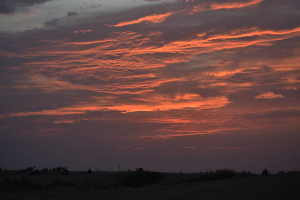 Majestic skies dusk after sunset with pink and orange coloured clouds on deep blue sky, Church Haven on the West Coast of South Africa