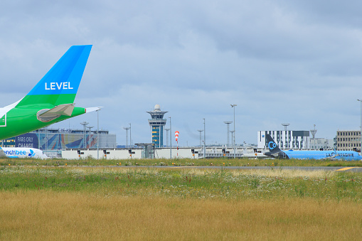 28 June 2020. Plane of different airlines parked on the tarmac of Orly airport.