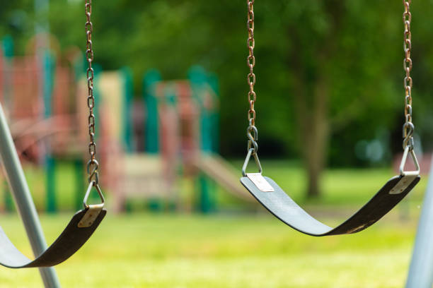 In Southwestern Missouri Empty School Yard Playground During COVID-19 Pandemic (Shot with Canon 5DS 50.6mp photos professionally retouched - Lightroom / Photoshop - original size 5792 x 8688 downsampled as needed for clarity and select focus used for dramatic effect)