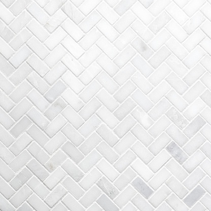 Textura de pared de mosaico de mármol de espiga blanca photo