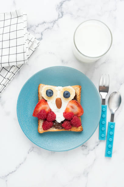 istock Breakfast toast for kids shaped as cute funny owl 1253112307