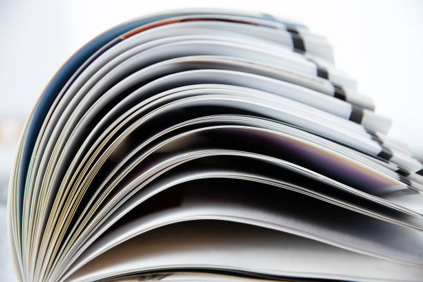 istock Background of an open book with bending pages 1253113846