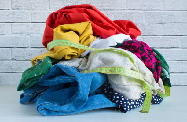 istock multicolored clothing and a measuring tape 1253115227