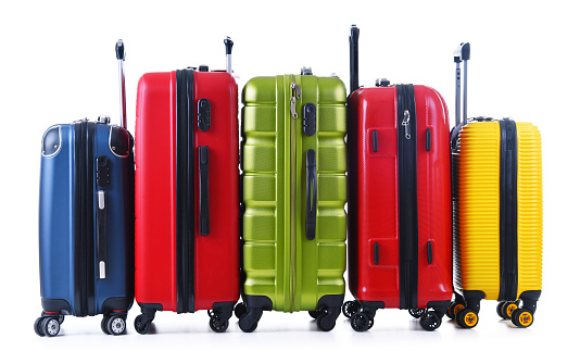 Travel suitcases isolated on white background.