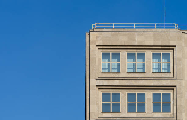 istock Low Angle View Of Building Against Clear Blue Sky 1253117919