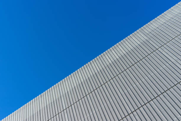istock Low Angle View Of Modern Building Against Clear Blue Sky 1253118183