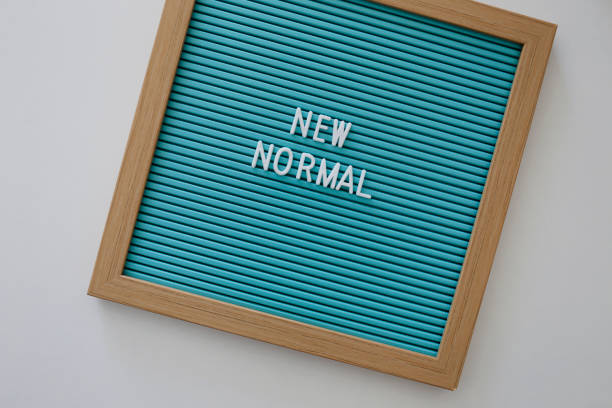 istock Sign with new normal text. Covid-19 pandemic 1253128586