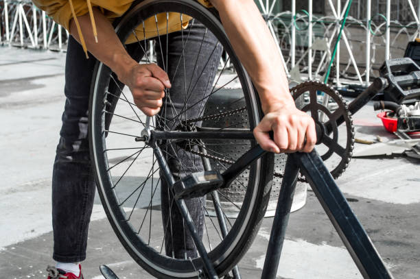 istock Mechanic fixing a bike 1253128597
