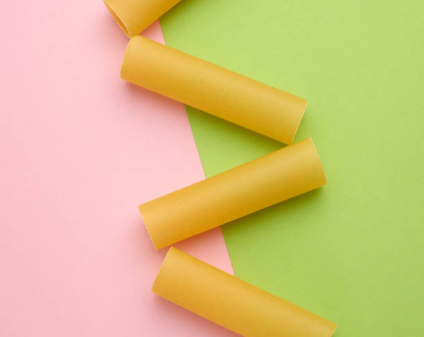 istock raw cannelloni pasta on a green pink background 1253131306