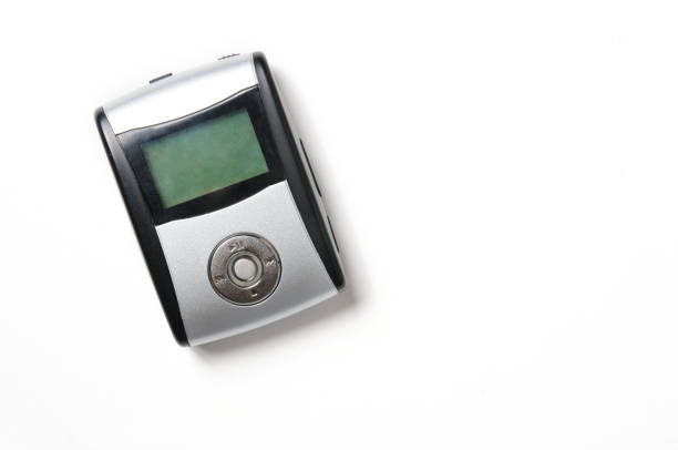 Vintage digital music player on isolated white background