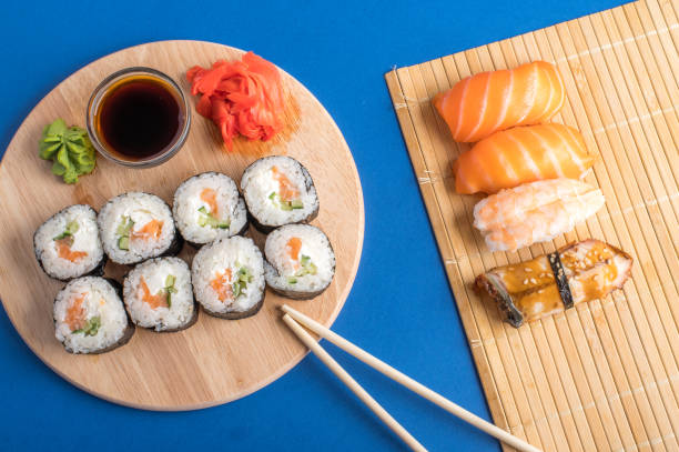 istock Composition with delicious nigiri sushi and rolls 1253135364