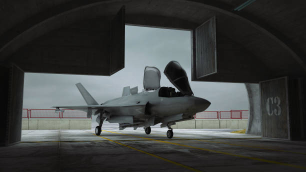 istock F 35 , american military fighter plane. Militay base, hangar, bunker 1253136849