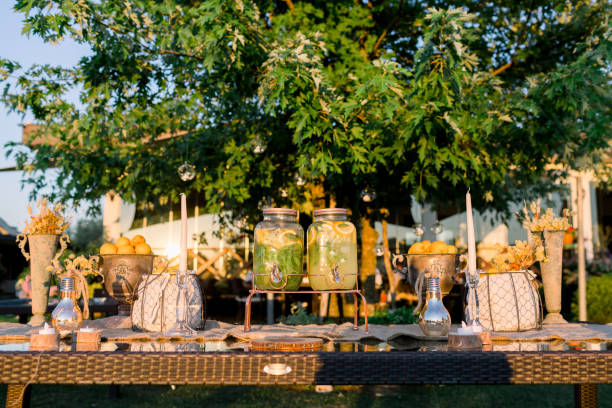 istock Lemonade buffet. Wedding area decoration. Preparations for the wedding 1253140281