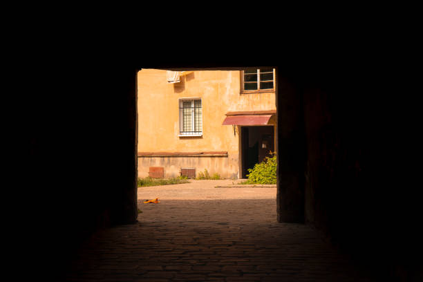 istock empty street old city back yard arch passage shadow frame work outside landmark concept view 1253140432