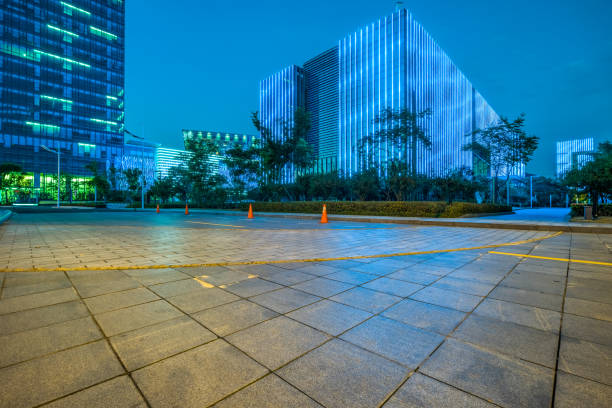 istock Empty brick road nearby office building 1253148253
