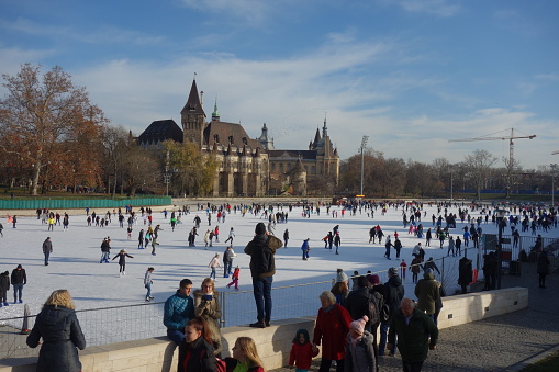 Budapest/Hungary - December 1st, 2019: City Park ice rink, Europe's largest outdoor ice skating rink in the winter and a lake for boating in the summer.