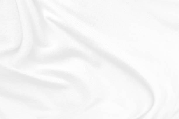 istock White cloth background abstract. Fabric is wrinkled and sofe wave. Material are used in textile assembly. 1253153875