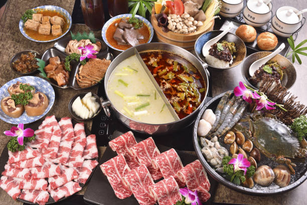 istock Various food served at the table with Chinese hotpot 1253156765