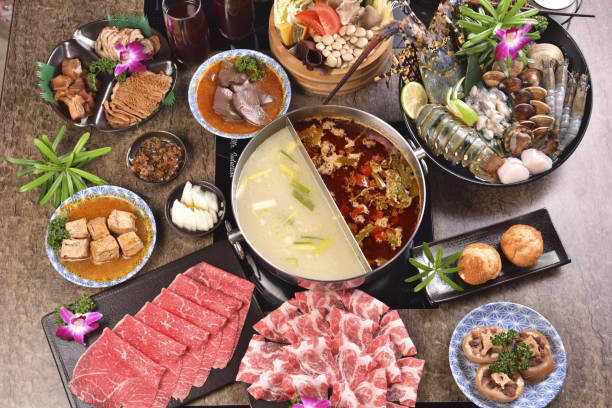 istock Various food served at the table with Chinese hotpot 1253157325