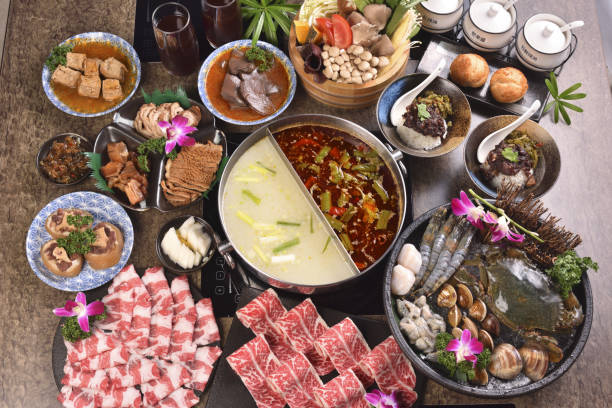 istock Various food served at the table with Chinese hotpot 1253157326