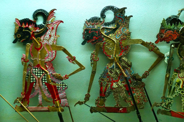 wayang kulit puppets a  traditional indonesian culture wayang kulit puppets is the art of Indonesian traditional culture performance

 made from dried buffalo skin. wayang kulit stock pictures, royalty-free photos & images