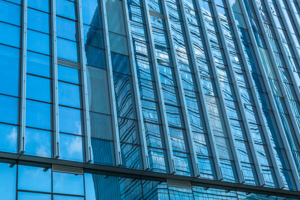 istock Urban abstract - windowed corner of office building 1253167563
