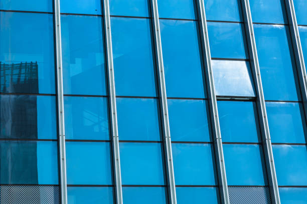 istock Urban abstract - windowed corner of office building 1253168109