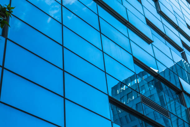 istock Urban abstract - windowed corner of office building 1253168124