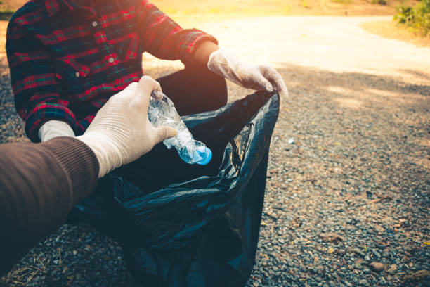 istock Group of people help garbage collection for to keep clean and take  recycling. 1253177957