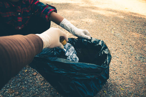 istock Group of people help garbage collection for to keep clean and take  recycling. 1253177965