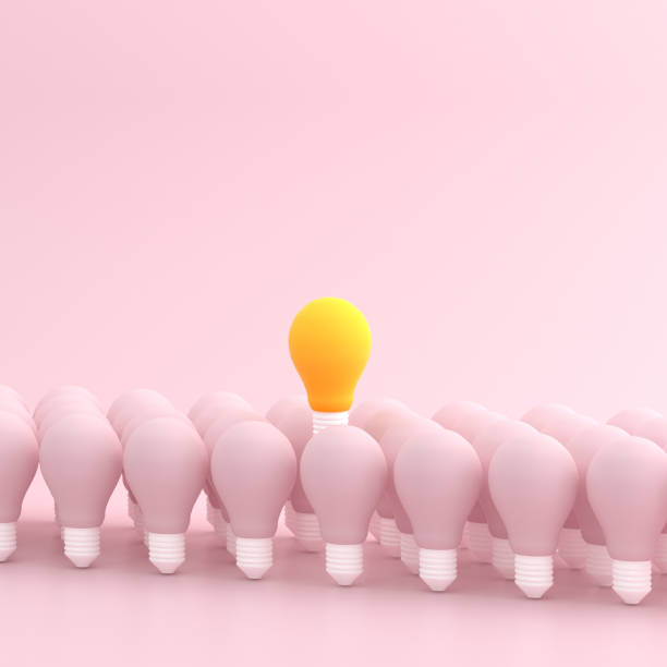 istock Mock up of floating light bulb above the others. 3D rendering. 1253179528