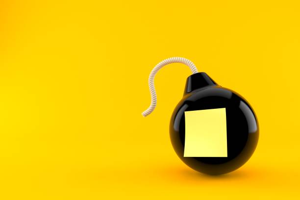 istock Bomb with blank yellow sticker 1253186474