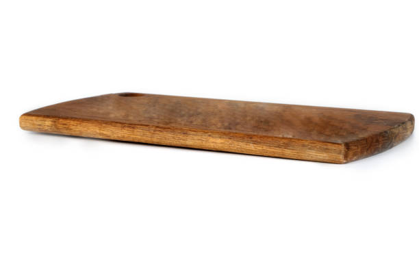 istock Old grunge wooden cutting kitchen desk board background texture 1253187409