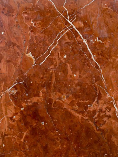 istock The red marble.Finishing stone. Texture. 1253189831
