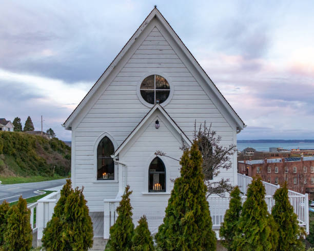 Quaint White Church on Hill at Dusk