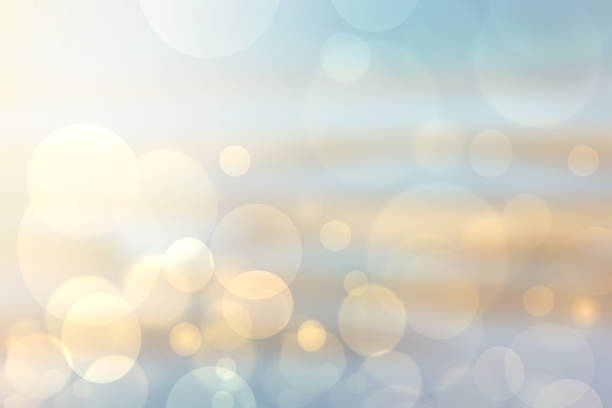 abstrakte helle gradient bewegung frühling oder sommer landschaft textur hintergrund mit natürlichen gold gelb bokeh lichter und blau hell sonnigen himmel. schöne kulisse mit platz für design. - light effect sunset light bright stock-fotos und bilder