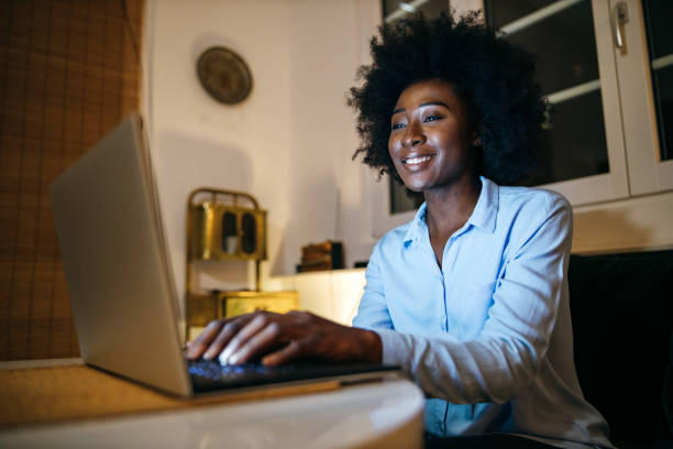 istock Young woman surfing the net 1253196370