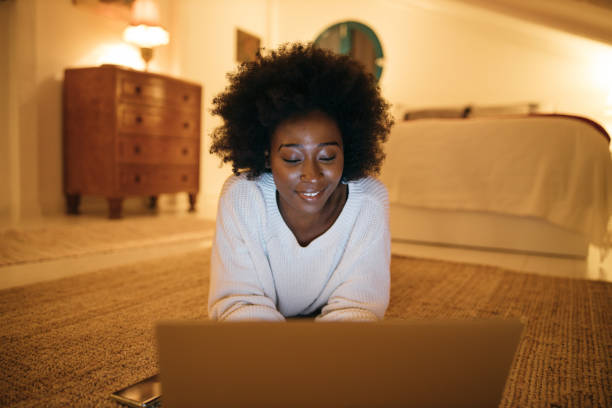 istock Young woman enjoys at home 1253196374