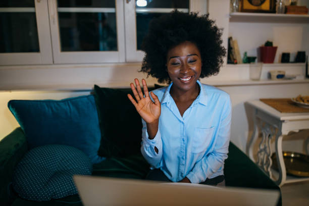 istock Young woman having video call 1253196380
