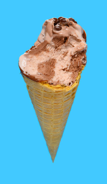 istock angle view fresh chocolate flavor ice cream cone with some bites on a blue background 1253199875