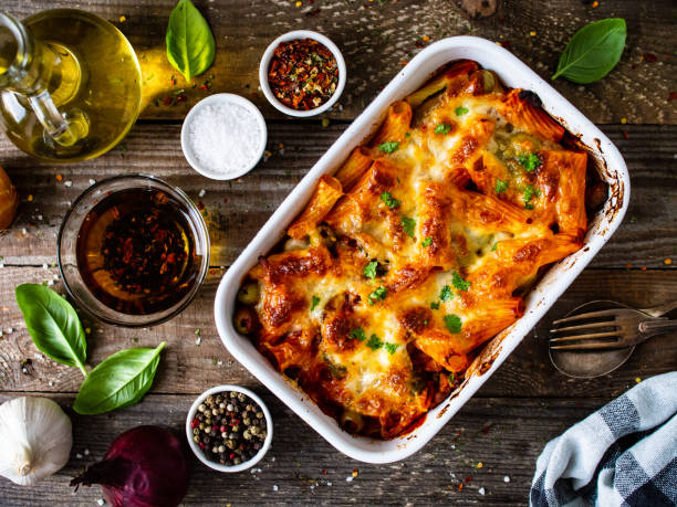 Pasta casserole with barbecue chicken breast, cheese and vegetables Pasta casserole with barbecue chicken breast, cheese and vegetables pasta casserole stock pictures, royalty-free photos & images