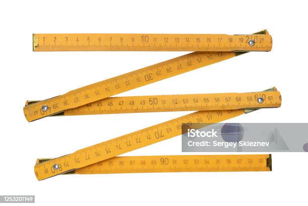 Yellow Wooden Folding Rule Stock Photo - Download Image Now - Folding Ruler, Carpentry, Cut Out