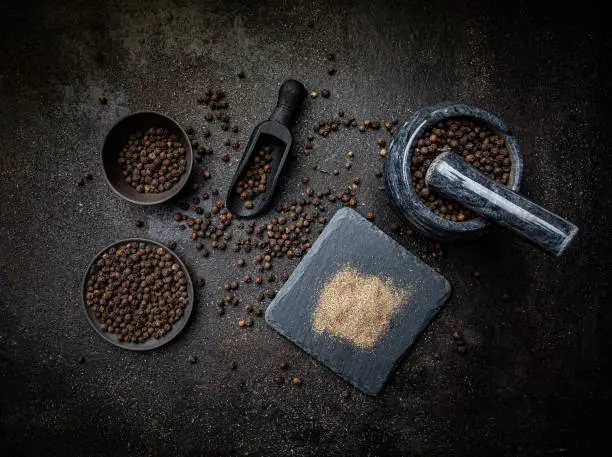 Photo of Pile of ground black pepper.