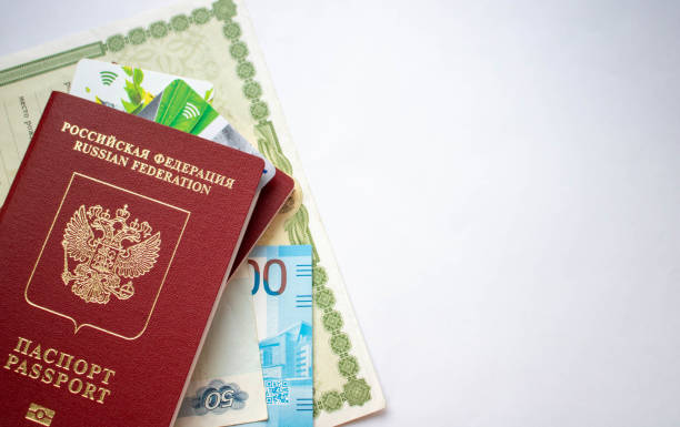 Kotlas, Russia-June 23, 2020. documents, two passports, cards, birth certificate.The concept of travel. space for text Kotlas, Russia-June 23, 2020. documents, two passports, cards, birth certificate The concept of travel kotlas stock pictures, royalty-free photos & images