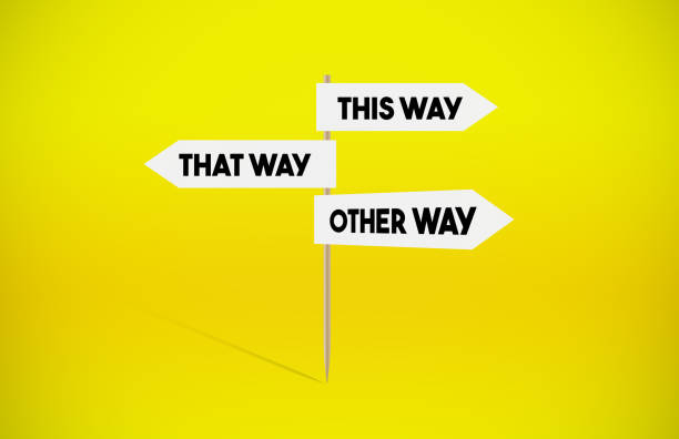 istock Decisions Directional Signboard on Yellow Background 1253206324