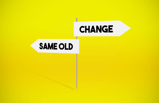 istock Change and Same old Directional Signboard on Yellow Background 1253206652