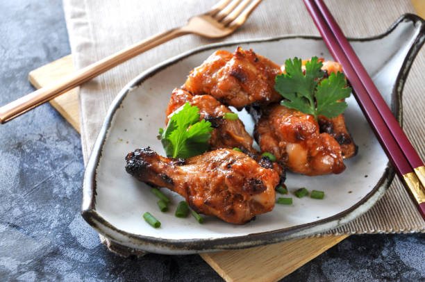 istock Grilled Chicken Drumsticks in Asian Style ready for Lunch 1253216592
