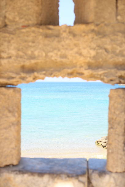 istock calm sea through stone window old fortress 1253217014