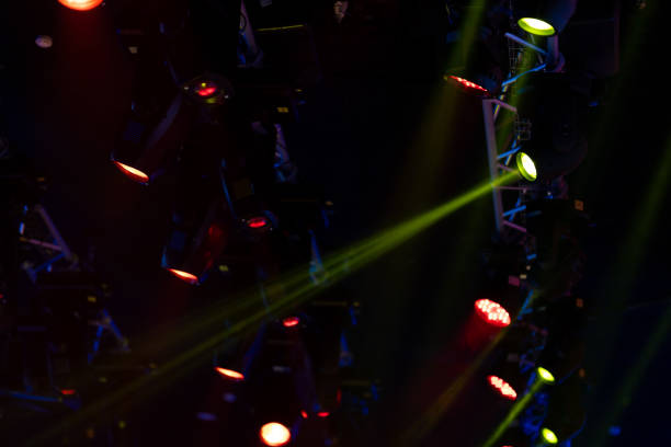 istock stage light with colored spotlights and smoke 1253218338