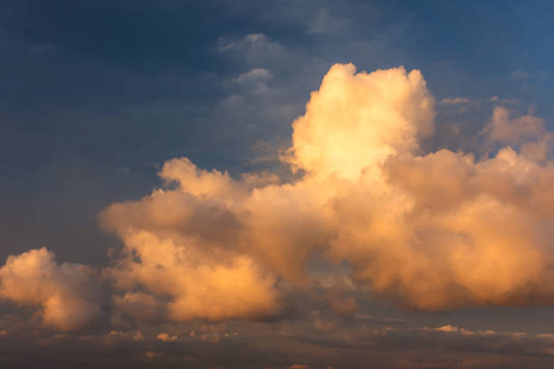 istock Huge Cumulus clouds in the sky. Pre-thunderstorm atmospheric condition 1253220203